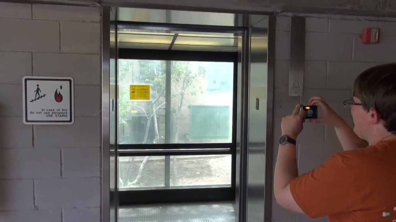Glass Dover Hydraulic Elevators at Garage 4, UT Austin, Austin, TX