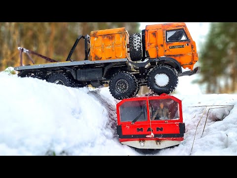 RC Winter Warriors KAMAZ 8x8 vs. MAN KAT 6x6 in Extreme Snow Challenge!