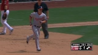 Moore's two-run shot hits pole, ties game