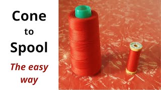 Wind cone thread to a spool using a bobbin winder spool pin (Sewing)