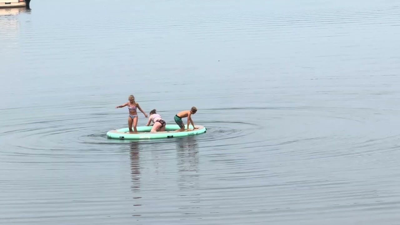 Kids playing on bote hangout at danas