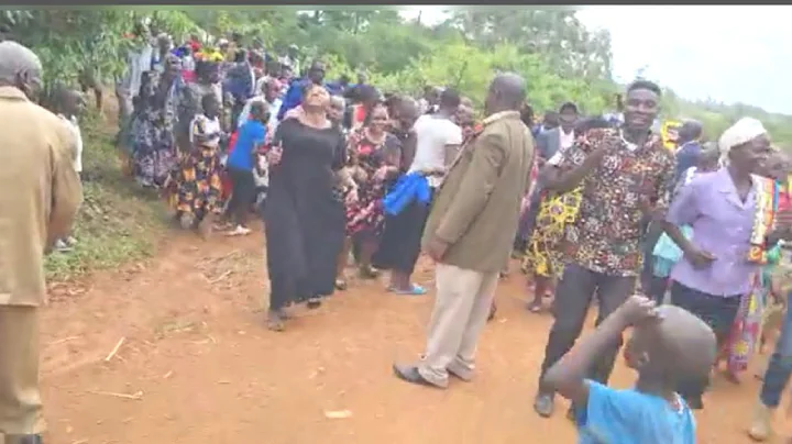 ma brother throwing money ,sweets at the grave of his mother inlaw, the of honouring, # Visukuti