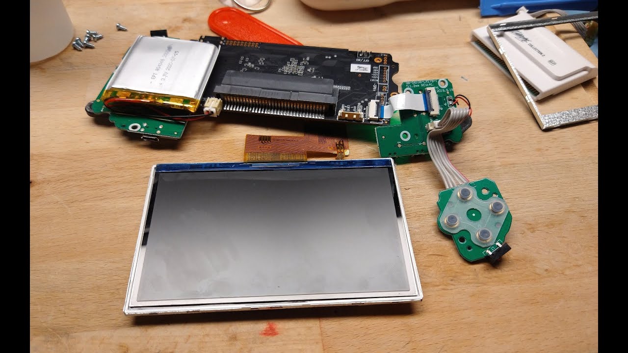 Opening up my Evercade handheld. (teardown, no voice over) YouTube