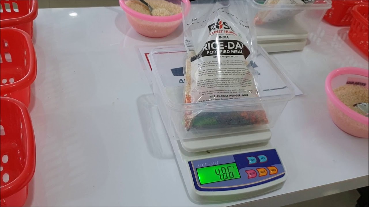 Rise Against Hunger India Meal Packaging Demo - YouTube