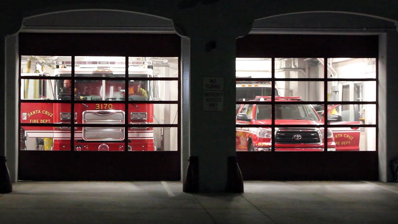 Fire Trucks and Police Cars Responding to a Vehicle Rollover (Full Station)
