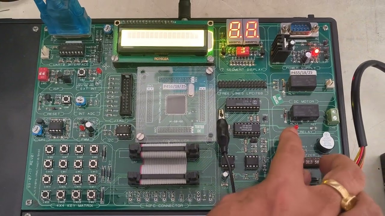Interface a simple switch and display its status through Relay, Buzzer and LED
