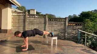 Feet elevated shoulder taps