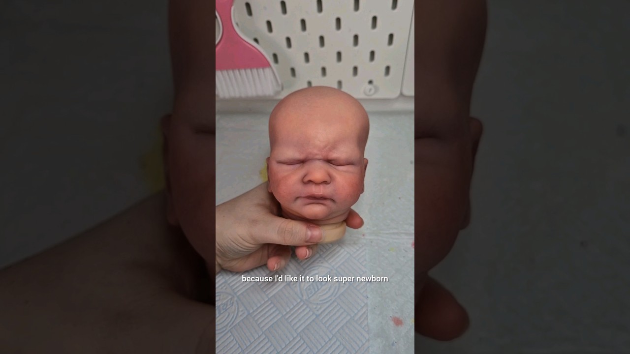 Painting hair on my latest baby! 