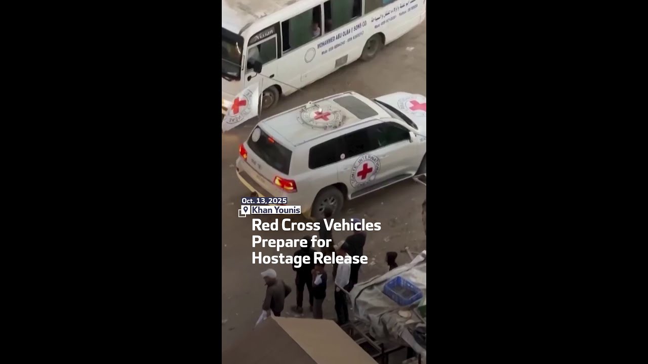 Red Cross Vehicles Prepare for Hostage Release