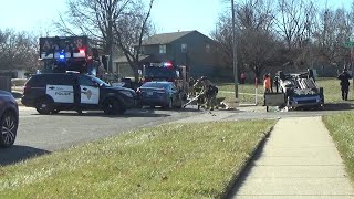 Two-vehicle crash sends one upside down