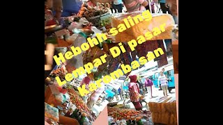 Kacau di Pasar  Karombasan , Penagi sewa dan Pedagang pasar Adu mulut sampai ,saling lempar