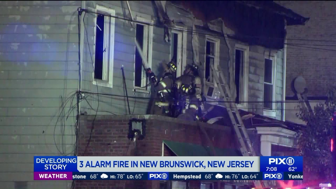 3 alarm fire tears through New Brunswick apartment building - YouTube