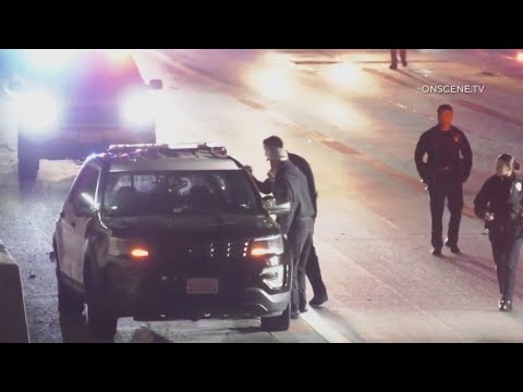 Driver arrested on suspicion of DUI after 2 officers injured - YouTube
