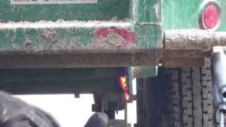 Tearing apart the big dump trailer to repair the box hinges
