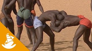 Wrestling is the king of sports in senegal, even more than football.
dream senegalese children to be wrestler and some day fight a national
stad...