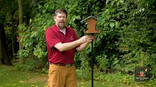 Installing your Nest Box or Feeder Atop Wild Birds Unlimited's Advanced Pole System Mounting Kit.
