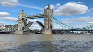 The Tower Bridge in London opens and closes.