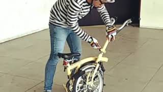 Brompton rolling, unfolding, riding, and folding