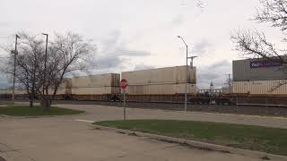 A BNSF Stack Train with 5 Units including 2 NS GE's glide through Fort Madison, IA!
