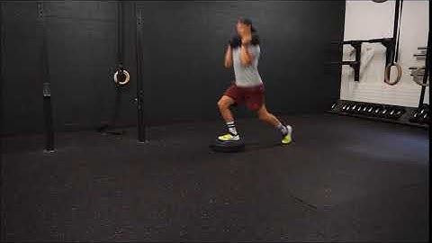DB Front Rack Front Foot Elevated Reverse Lunge