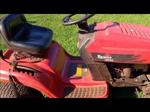 Vídeo: Como você mede a correia de um trator de gramado?
