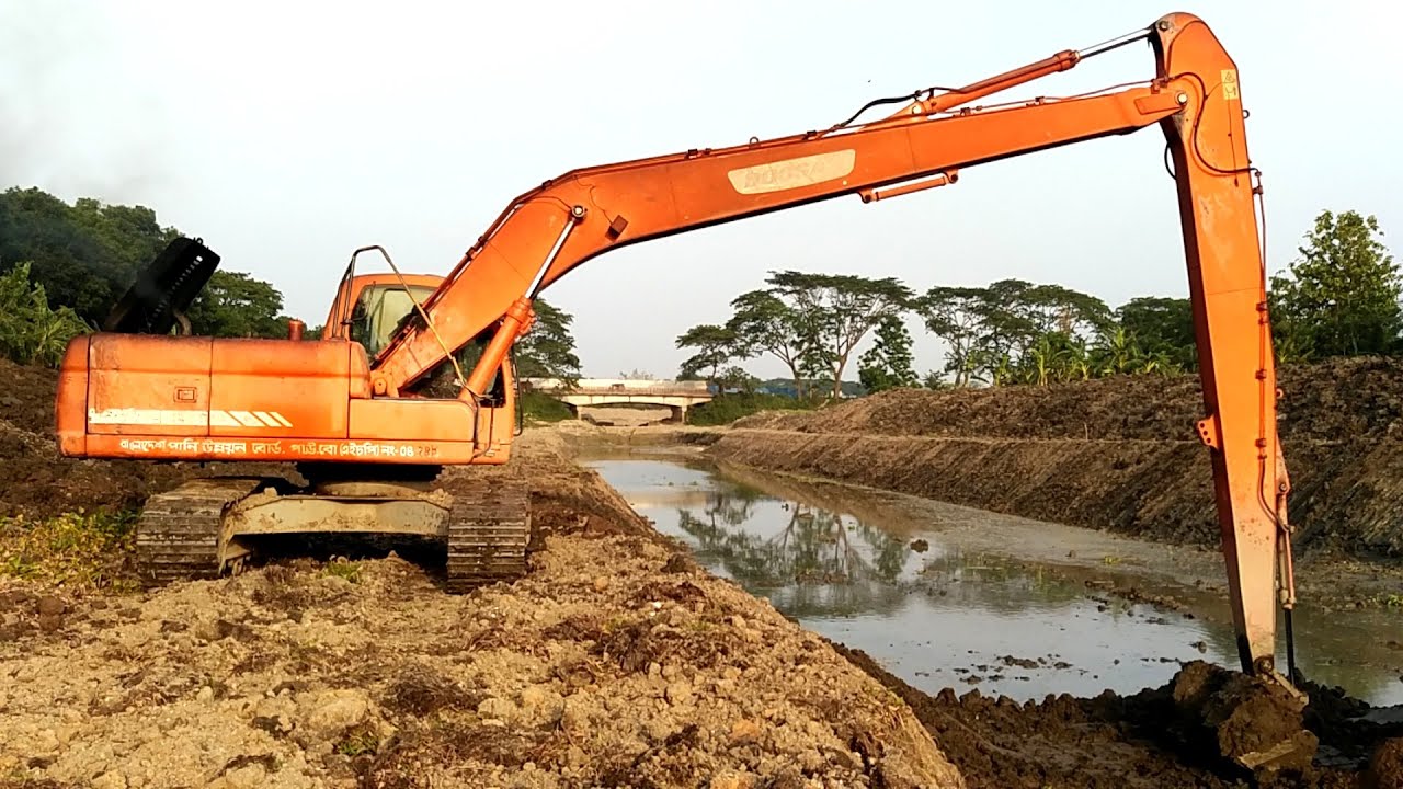 Long Reach Excavator Digging Dead River - YouTube