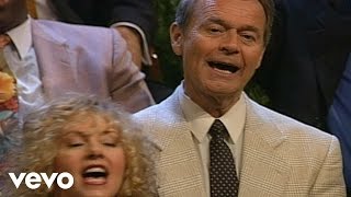 Video thumbnail of "Bill & Gloria Gaither - Bless His Holy Name (Live)"