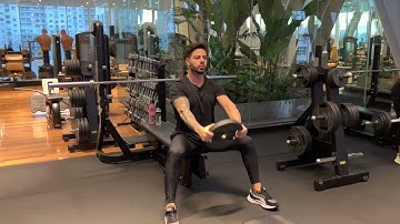 Elevação Frontal Sentado com Anilha