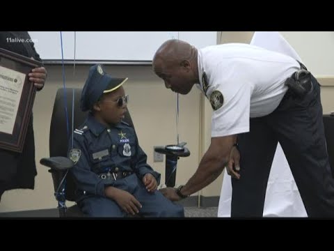 A boy with brain cancer wants to be a police officer. Clayton County Police made it happen.