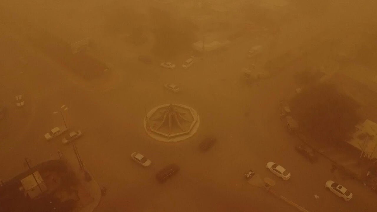 Southern Iraqi city blanketed by thick sheet of orange during sandstorm | AFP