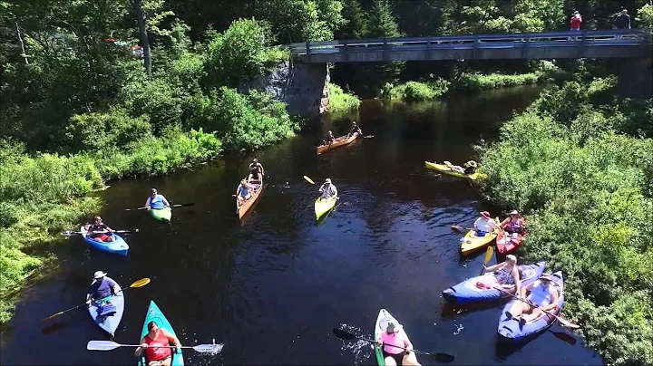 Kayaks in Old Forge on the Moose River