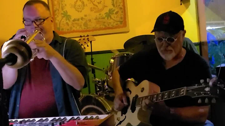 Derek Sims on trumpet and keyboard, Carlos Tamati ...