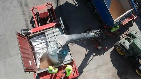 Loading grains into container by Fast Freight