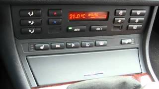 BMW E46 Alpine head unit in ashtray