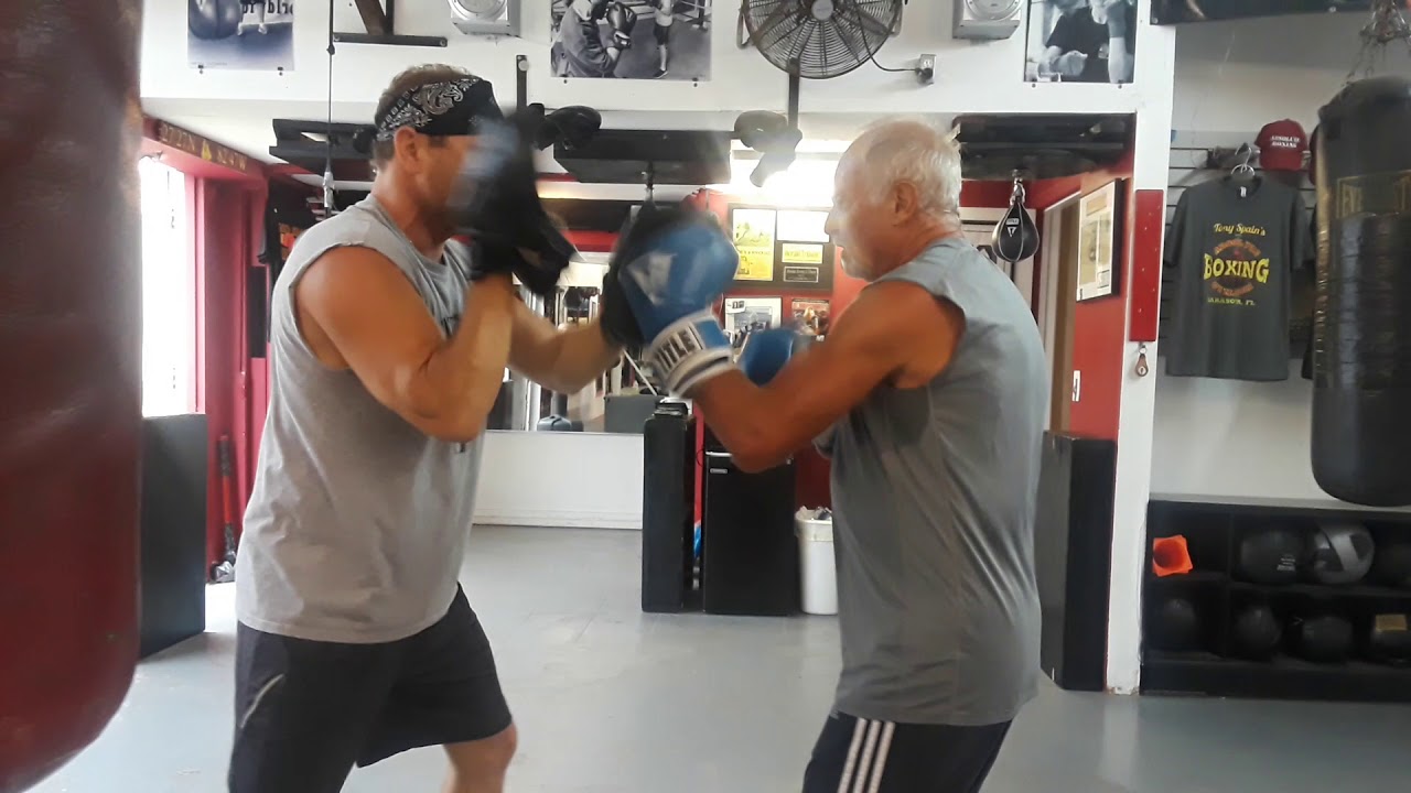 Watch 77 year old "Stan The Man" killer mitt routine.