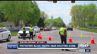 Protesters gather at scene where man was shot by IMPD officer