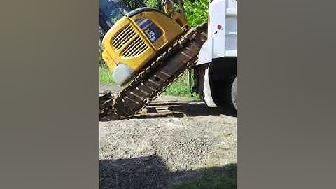 How to load mini excavator onto dump truck
