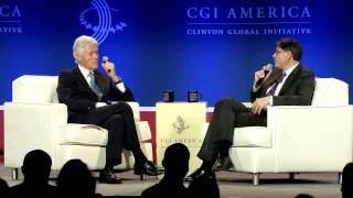 President Bill Clinton talks with Jack Lew - CGI America 2013