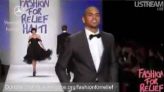 Famous Chris Brown walking the runway at Naomi Campbell's "Fashion for Haiti" Event Net Worth