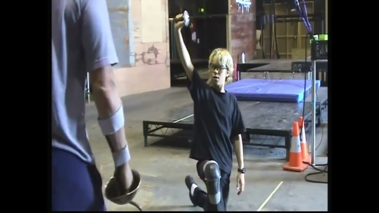 Peter Pan and Capt. Hook practicing swordfight