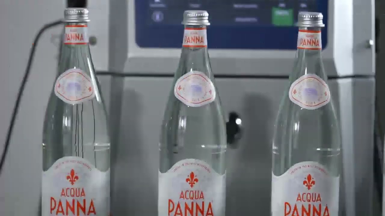 UKCM(HKCM)VIDEO-Our Coding and Marking Printing Solutions for  Glass Bottle of Water.