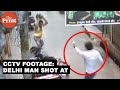 Cctv man on motorcycle shot at by two gunmen in delhi