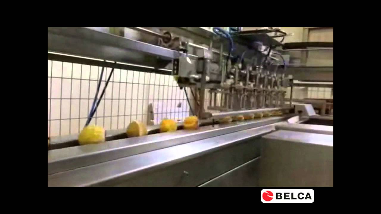 Envasado flowpack y posicionado automatico de magdalenas