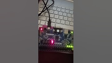 Signed 3-bit Full Adder with SSD on FPGA