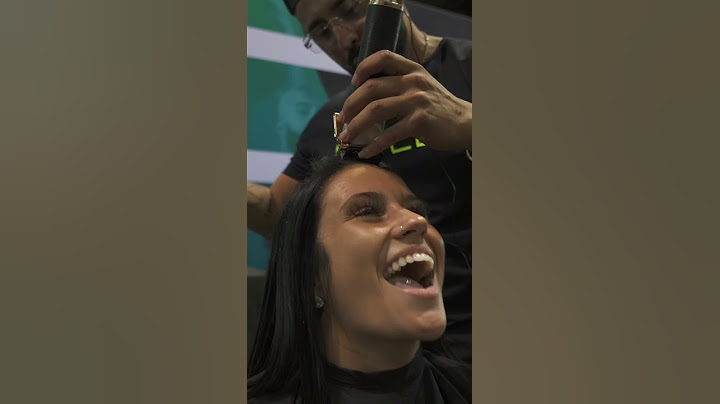 Shaving her head for Breast cancer awareness