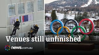 Last minute scramble to finish Winter Olympic venues with only days to go Snow Blankets Cortina As Workers Race To Finish Venues