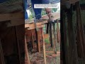 Securing Timber Beams with a Hammer and Clamp | Traditional Wood Framing Technique