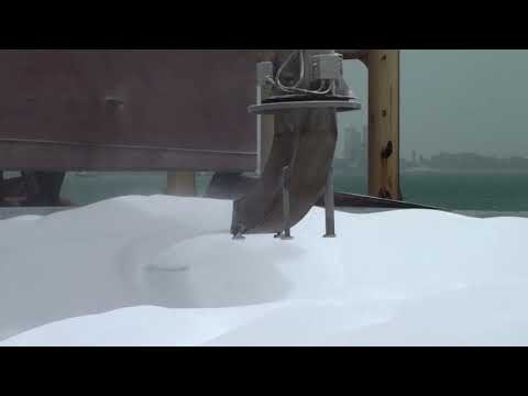 AMECO Shiploader loading urea into a bulk carrier