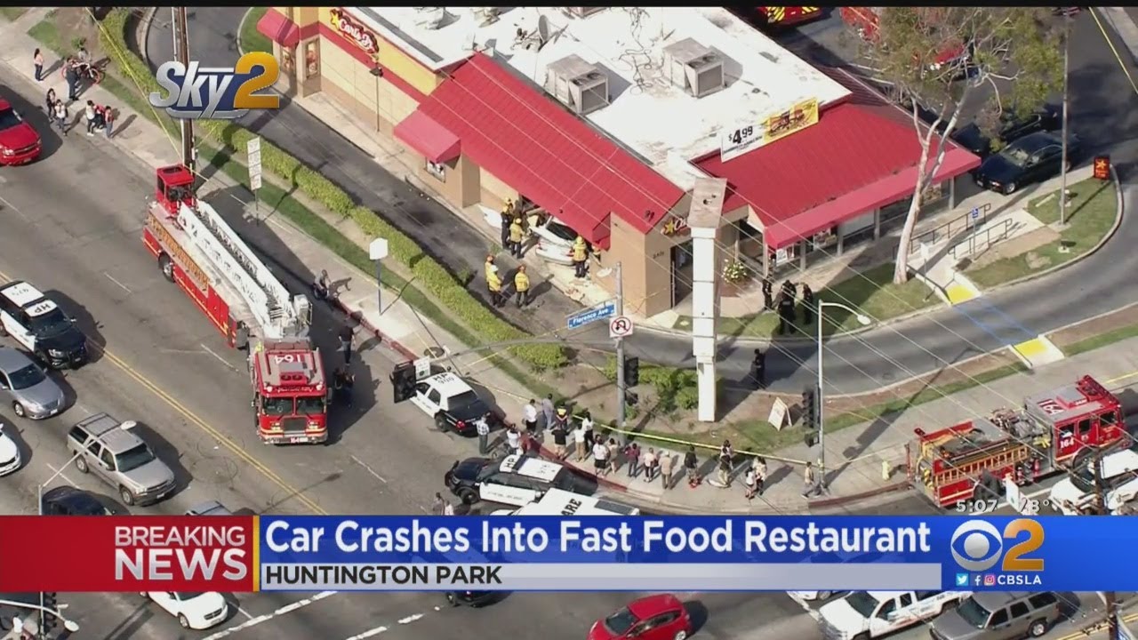 Car Crashes Into Fast Food Restaurant - YouTube