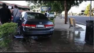 Car Crashes Into Parking Lot On Coffee Road In Modesto, California